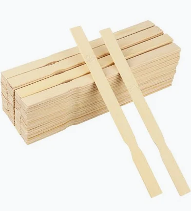 Wooden paint stir sticks — representative photograph; displayed quantity does not indicate selling unit